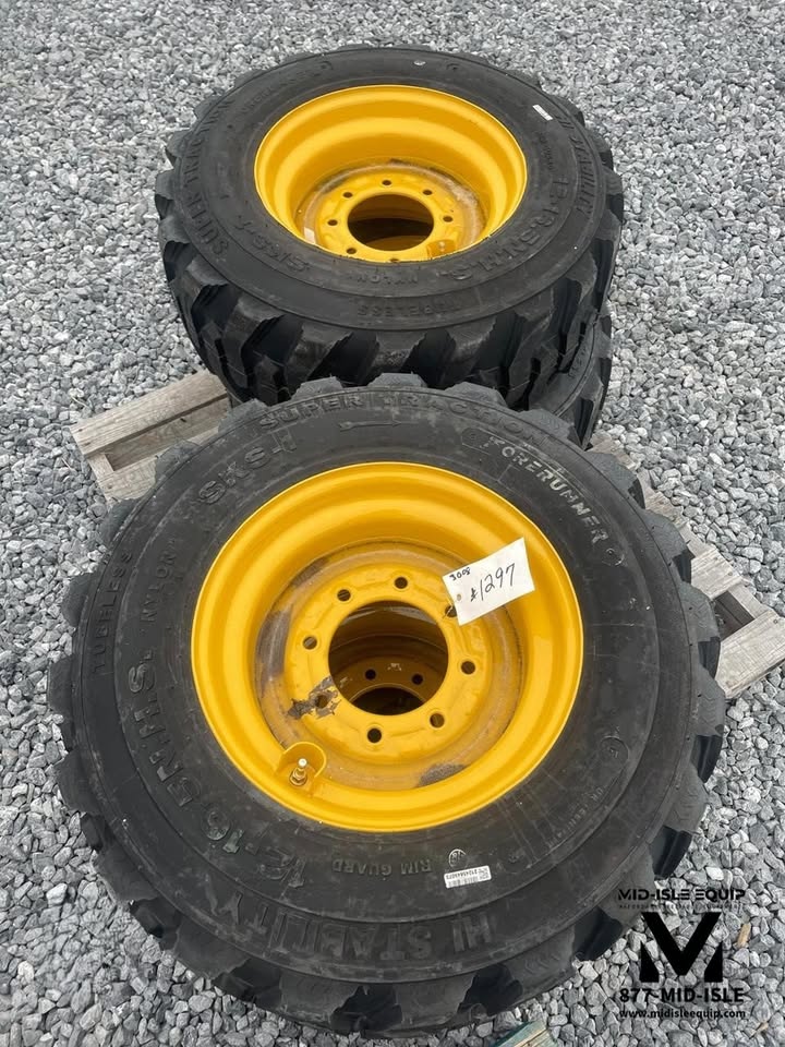 CAT SKID STEER WHEELS & TIRES 12-16.5 NEW