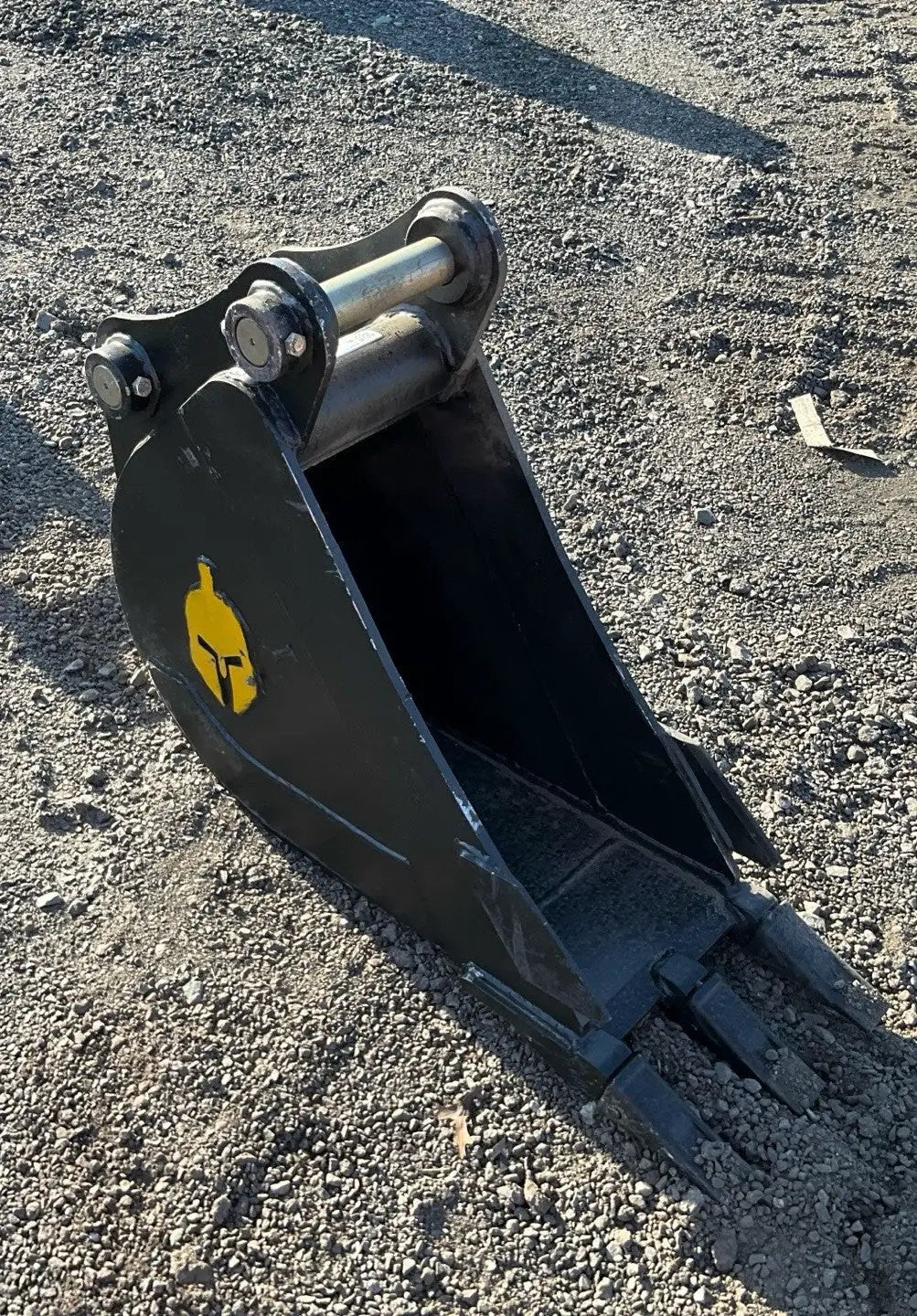 Trojan 12in excavator bucket attachment; black steel with yellow logo for 5-ton machines