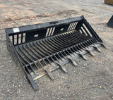 Wildcat 84-inch rock skeleton bucket with teeth for skid steer attachment
