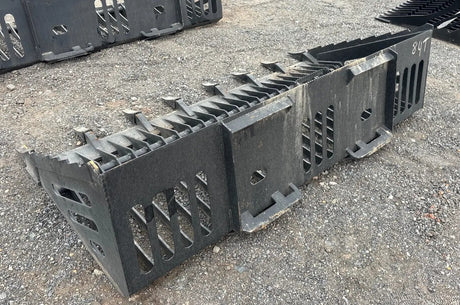 Wildcat 84-Inch Rock Skeleton Bucket with Teeth for Skid Steer; black steel attachment, two units visible.
