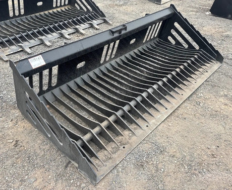 Two Wildcat 84-inch heavy-duty skeleton rock buckets for skid steer attachment