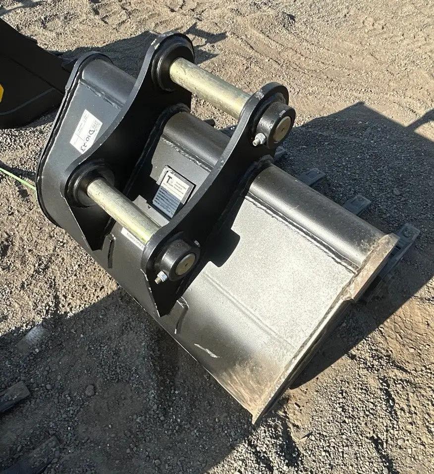 36 Inch Trojan digging bucket for CAT 307/308 excavator, heavy-duty steel attachment.