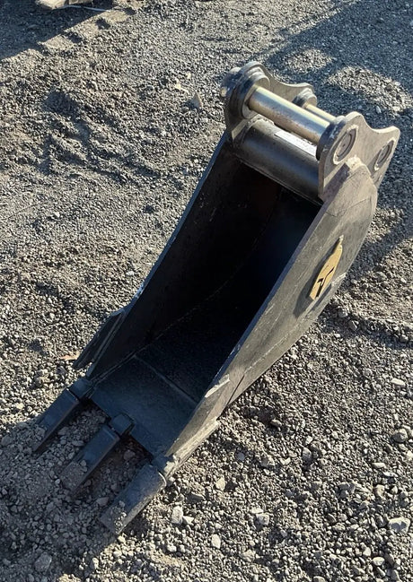 Trojan 12-inch excavator bucket attachment in black steel with Trojan logo for 5-ton CAT 305, JD50, PC55 machines